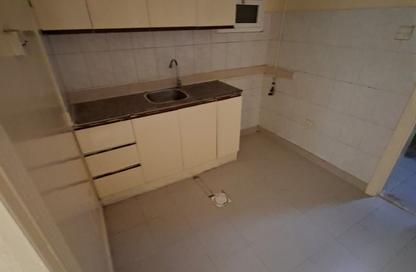 Apartment - Studio - 1 Bathroom for rent in Al Dhahri Building - Al Shuwaiheen - Sharjah