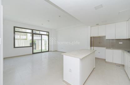 Townhouse - 4 - 4 for rent in Noor Townhouses - Town Square - Dubai
