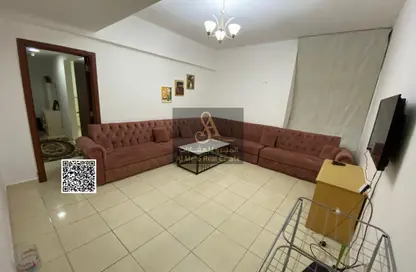 شقة - غرفة نوم - 2 حمامات للايجار في أورينت تاور 1 - أورينت تاور - البستان - عجمان