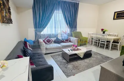 شقة - 2 غرف نوم - 2 حمامات للايجار في الممزر بلازا - شارع التعاون - التعاون - الشارقة