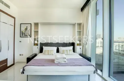 Apartment - 1 Bathroom for sale in Miraclz Tower by Danube - Arjan - Dubai