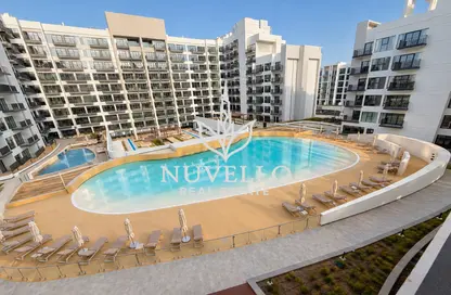 شقة - غرفة نوم - 1 حمام للايجار في عزيزي ميراج - ستوديو سيتي - دبي