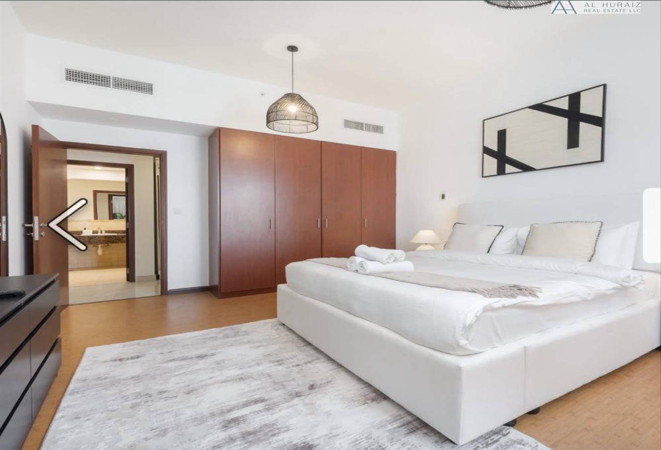 Luxurious 4BR+Maids JBR Apartment with Stunning Marina & Sea Views photo 9