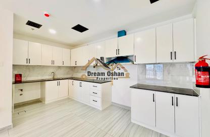 Apartment - 1 - 2 for rent in Al Amir Abdullah Building - International City Phase 2 (Al Warsan 4) - Dubai