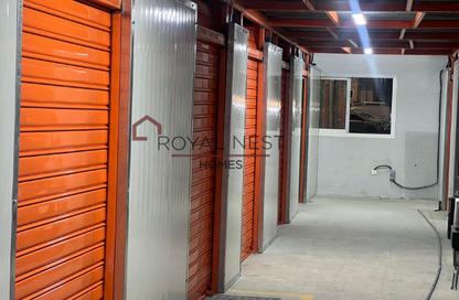 Warehouse - Studio - 2 Bathrooms for rent in Emirates Cluster - International City - Dubai