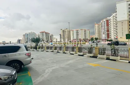 محل - استوديو - 1 حمام للايجار في II جلوبال جرين فيو - منطقة مركز الأعمال - المدينة العالمية - دبي