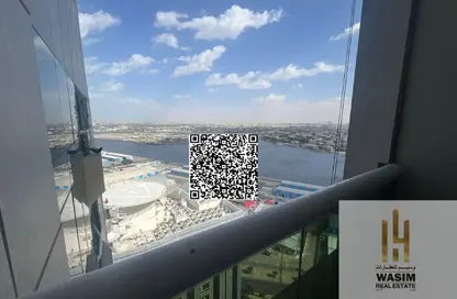 شقة - غرفة نوم - 2 حمامات للايجار في أورينت تاور 1 - أورينت تاور - البستان - عجمان