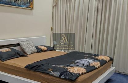 Apartment - 2 Bedrooms - 3 Bathrooms for sale in Orient Tower 1 - Orient Towers - Al Bustan - Ajman
