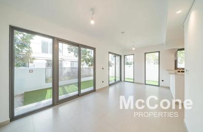 Townhouse - 4 - 5 for rent in Aura Gardens - Tilal Al Ghaf - Dubai