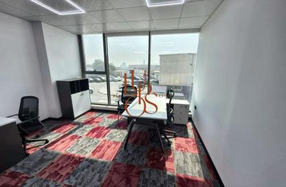 Business Centre - Studio - 1 for rent in Ramool New Building 2 - Umm Ramool - Dubai
