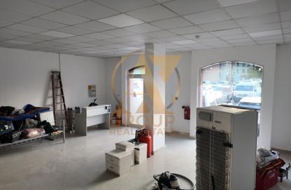 Shop - Studio for rent in Building Z04 - England Cluster - International City - Dubai