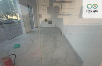 Shop - Studio for rent in Al Rashidiya Towers - Al Rashidiya - Ajman Downtown - Ajman