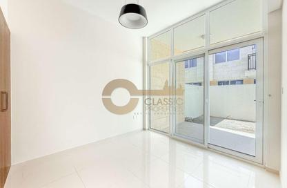 Townhouse - 4 - 3 for sale in Victoria - Damac Hills 2 - Dubai