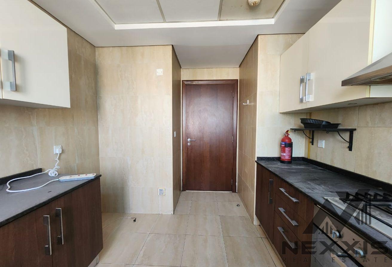 Elegant Apartment with Maid Room | Prime Location photo 12