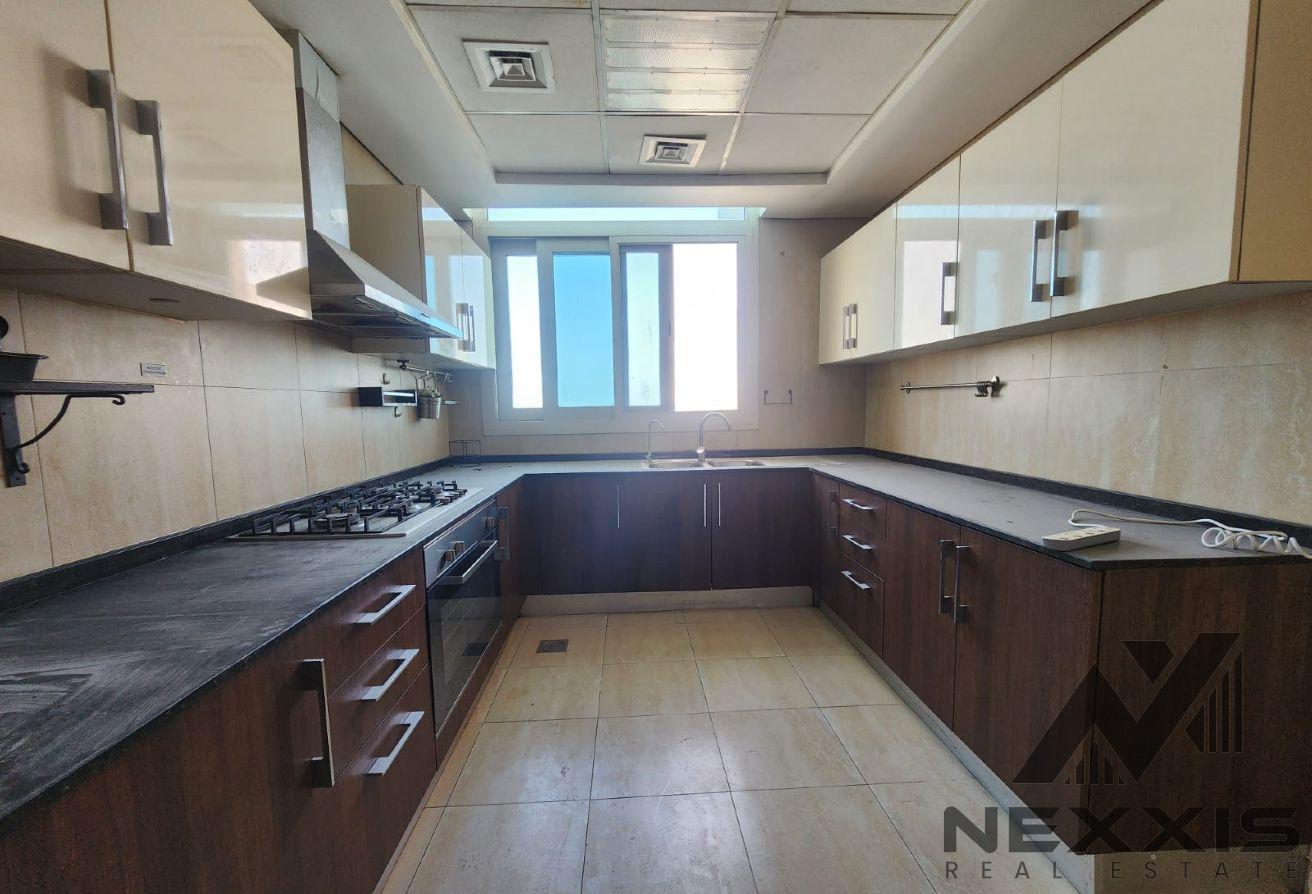 Elegant Apartment with Maid Room | Prime Location photo 14