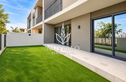 Townhouse - 3 - 4 for rent in Aura Gardens - Tilal Al Ghaf - Dubai