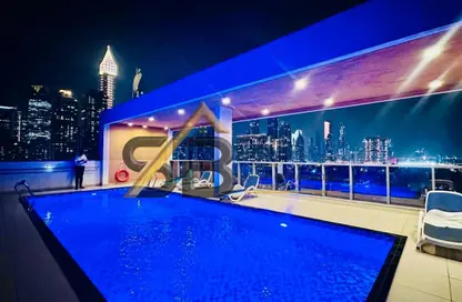 Apartment - 1 Bedroom - 2 Bathrooms for rent in Jumeirah Garden City - Al Satwa - Dubai