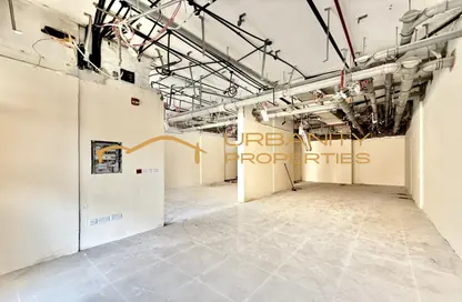 Shop - Studio - 2 Bathrooms for rent in Trafalgar Tower - CBD (Central Business District) - International City - Dubai