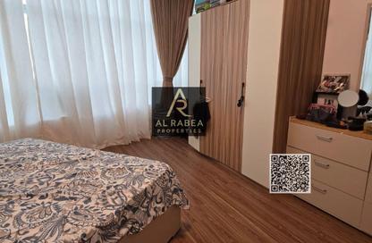 Apartment - 2 Bedrooms - 3 Bathrooms for rent in Orient Tower 1 - Orient Towers - Al Bustan - Ajman