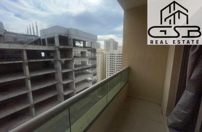 Apartment - 2 Bedrooms - 2 Bathrooms for sale in Paradise Lakes Towers - Emirates City - Ajman