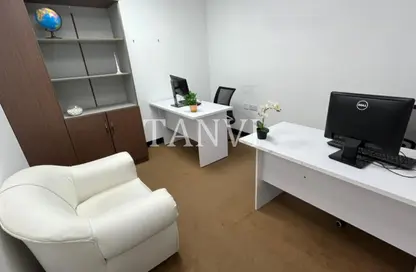 Office Space - Studio - 1 Bathroom for rent in Al Rostamani Building - Port Saeed - Deira - Dubai