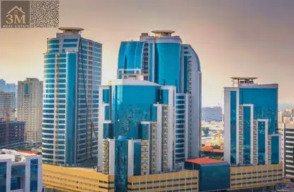 شقة - غرفة نوم - 2 حمامات للبيع في أورينت تاور 1 - أورينت تاور - البستان - عجمان