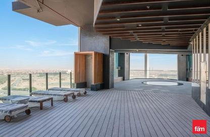 Apartment - 1 Bedroom - 2 Bathrooms for sale in Miraclz Tower by Danube - Arjan - Dubai