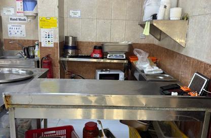 Shop - Studio - 1 Bathroom for rent in Building Y20 - England Cluster - International City - Dubai
