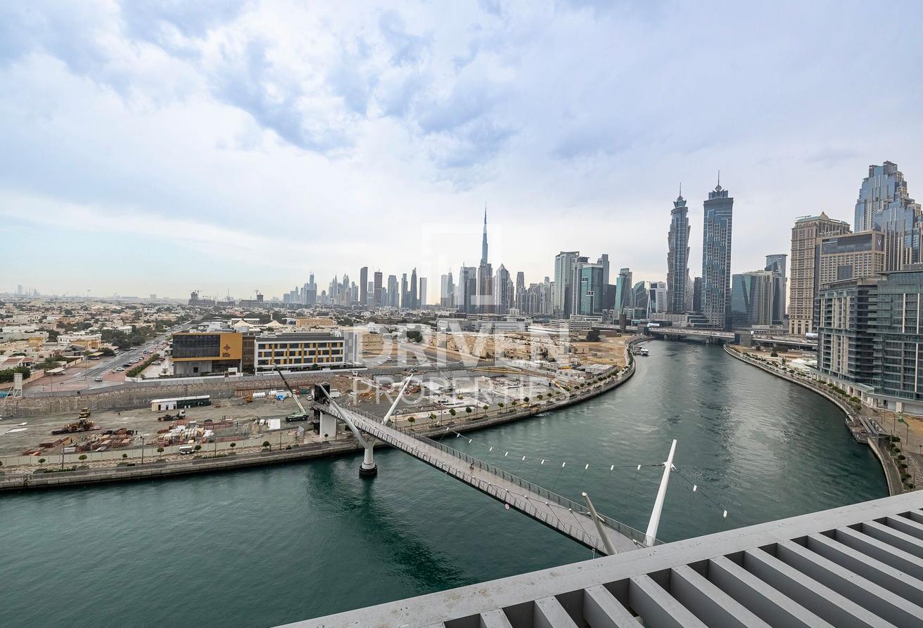 Full Canal and Burj Khalifa View | Spacious Layout photo 22
