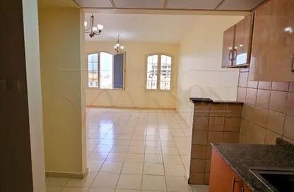 Apartment - 1 Bathroom for rent in Building X03 - England Cluster - International City - Dubai