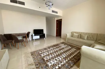 شقة - غرفة نوم - 2 حمامات للايجار في أورينت تاور 1 - أورينت تاور - البستان - عجمان