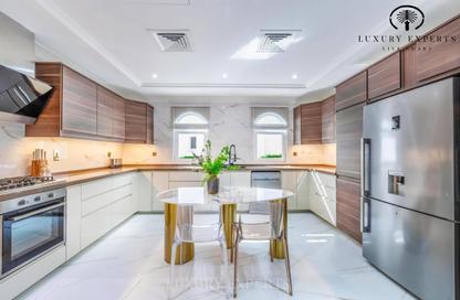 Villa - 4 - 5 for rent in Garden Homes Frond C - Garden Homes - Palm Jumeirah - Dubai