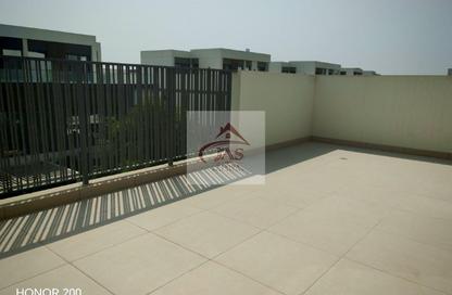 Townhouse - 5 - 6 for rent in Aura Gardens - Tilal Al Ghaf - Dubai