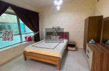 Apartment - Studio - 1 Bathroom for sale in Mandarin Towers - Garden City - Ajman