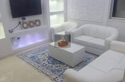 شقة - غرفة نوم - 2 حمامات للبيع في أورينت تاور 1 - أورينت تاور - البستان - عجمان