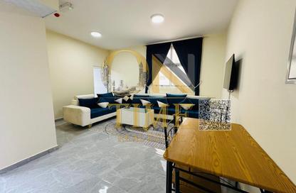 Apartment - 1 Bedroom - 2 Bathrooms for rent in Corniche Tower - Ajman Corniche Road - Ajman