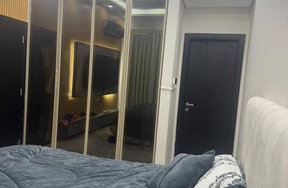 Apartment - 1 - 2 for sale in Smart Tower 1 - Al Amerah - Ajman