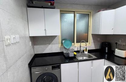 Apartment - 1 Bedroom - 2 Bathrooms for sale in Lilies Tower - Emirates City - Ajman