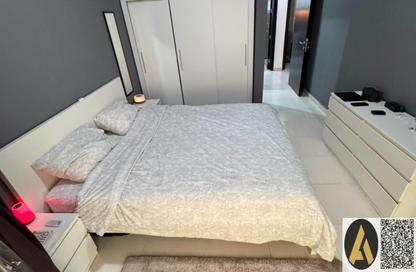 Apartment - 1 Bedroom - 2 Bathrooms for sale in Lilies Tower - Emirates City - Ajman