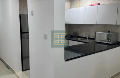 Apartment - 1 - 2 for sale in Maya 3 - Dubai Land Residence Complex - Dubai