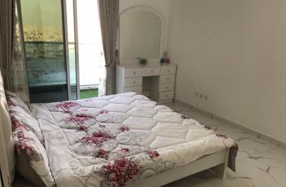 Apartment - 1 Bedroom - 2 Bathrooms for rent in Orient Tower 1 - Orient Towers - Al Bustan - Ajman