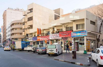 عمارة بالكامل - 8 غرف نوم - 8 حمامات للبيع في السوق الكبير - بر دبي - دبي