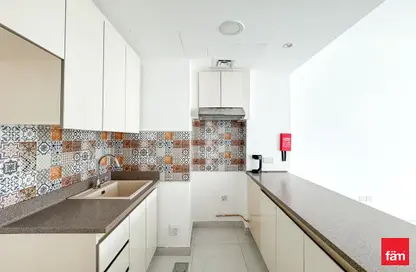 Apartment - 1 Bedroom - 2 Bathrooms for rent in Rabdan Building - Motor City - Dubai
