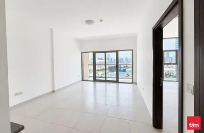Apartment - 1 Bedroom for rent in Rabdan Building - Motor City - Dubai