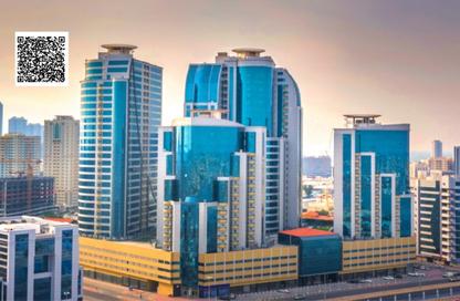 شقة - غرفة نوم - 2 حمامات للايجار في أورينت تاور 1 - أورينت تاور - البستان - عجمان