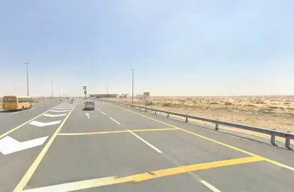 أرض - استوديو للبيع في العذيب - ضاحية الرويضات - الشارقة