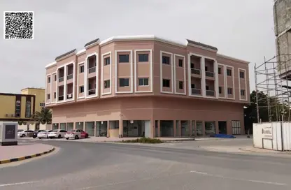 عمارة بالكامل للبيع في 1  الروضة - الروضة - عجمان