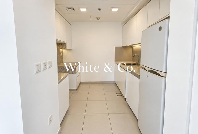 SEMI-CLOSED KITCHEN | POOL VIEW | VACANT