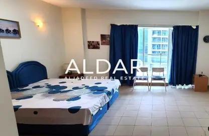 Apartment - Studio - 1 Bathroom for rent in Cricket Tower - Dubai Sports City - Dubai