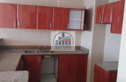 Apartment - 1 Bedroom - 2 Bathrooms for rent in Building IC1-EMR-12 - Emirates Cluster - International City - Dubai